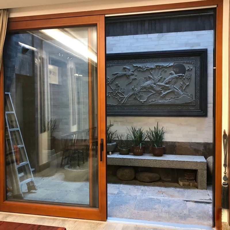 嚴嚴冬日里選擇保暖的鋁木復合門窗有多重要？